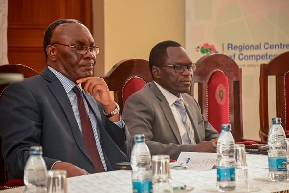 Kenyan Principal Secretary State Department for Broadcasting and Telecommunications, Steve Isaboke (right)